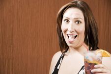 Hispanic Woman With A Drink Stock Images