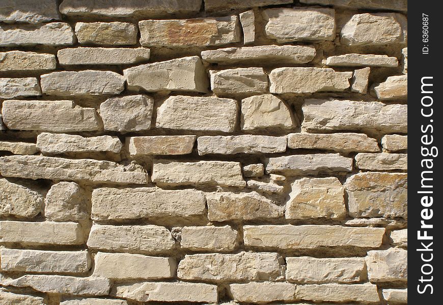 An old shabby brick wall. An old shabby brick wall
