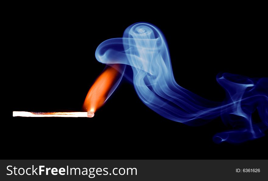 Match fire smoke on black background