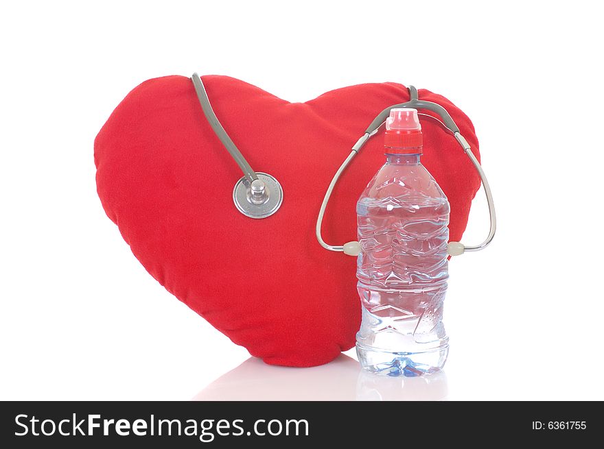 Heart with bottle and stethoscope isolated on white background. Heart with bottle and stethoscope isolated on white background