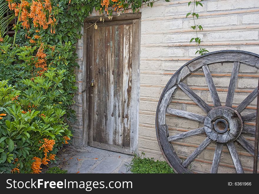 Old Door And Wheel
