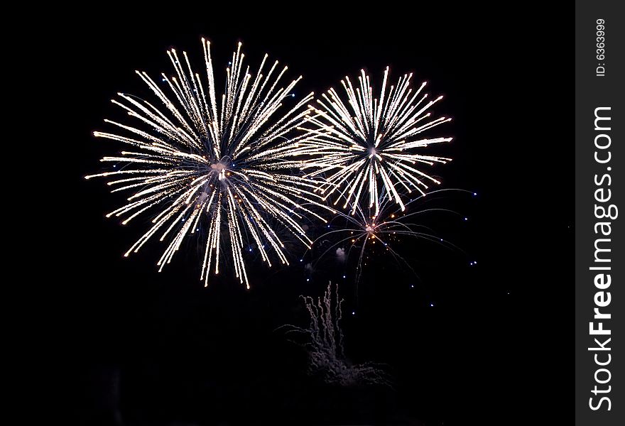 Fireworks Celebration over black night sky background