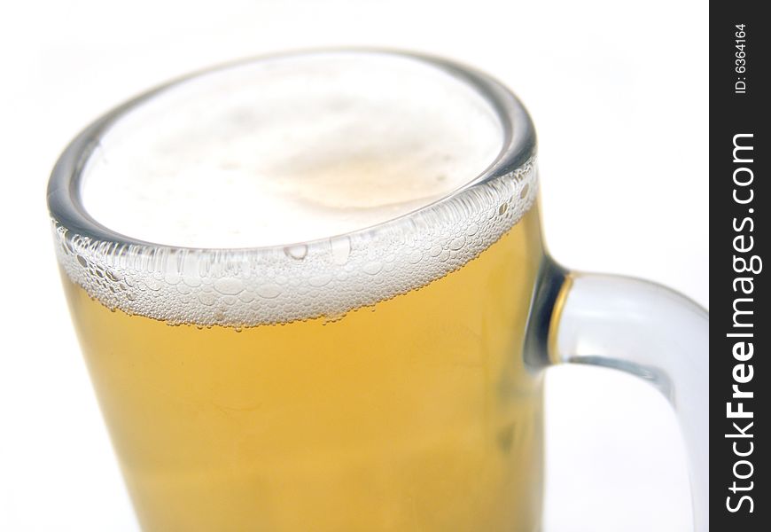 Close up of glass mug with beer. Close up of glass mug with beer