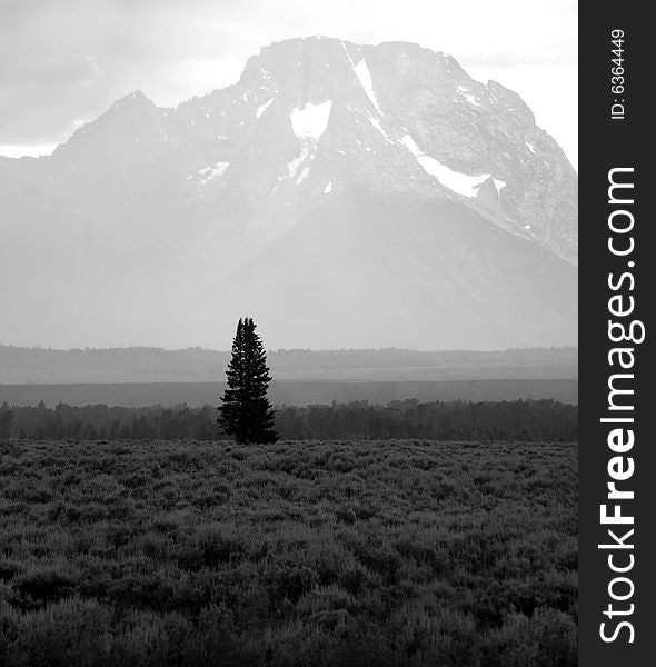 Detail of Tetons Mountains with stormy sky and rain. Detail of Tetons Mountains with stormy sky and rain