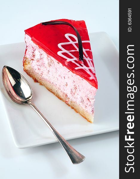 Cheese cake with strawberry topping. Cheese cake with strawberry topping