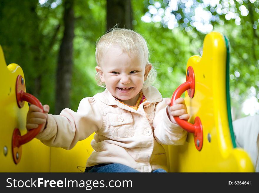 The child on an attraction. The child on an attraction