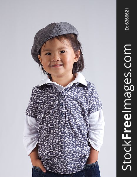 Little asian girl wearing a hat. Little asian girl wearing a hat