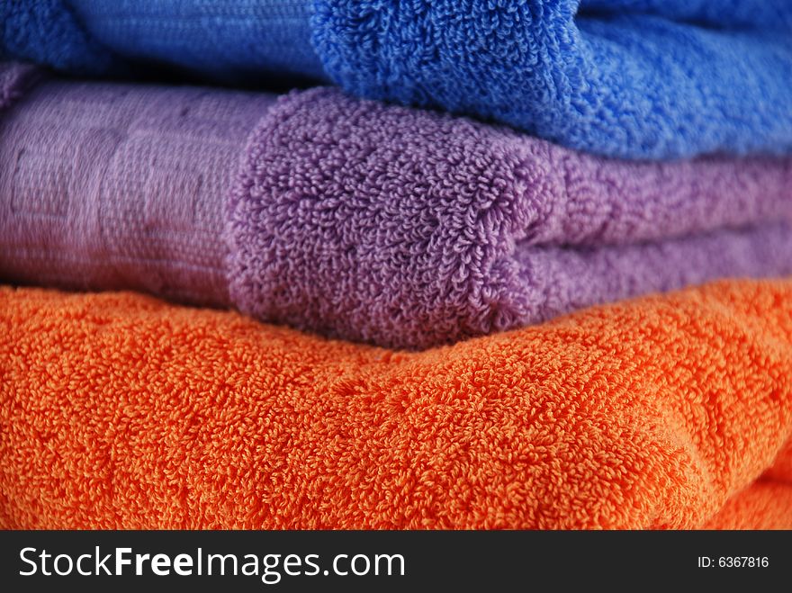 Stock pictures of colorful bath towels stacked