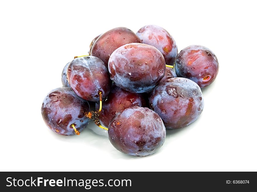 Stak of big,ripe plums.