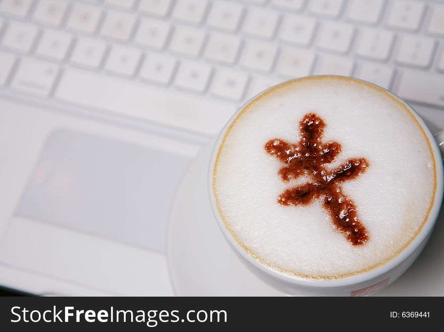 Coffee with RMB sign on keyboard