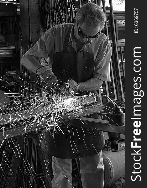 A blacksmith in the workshop