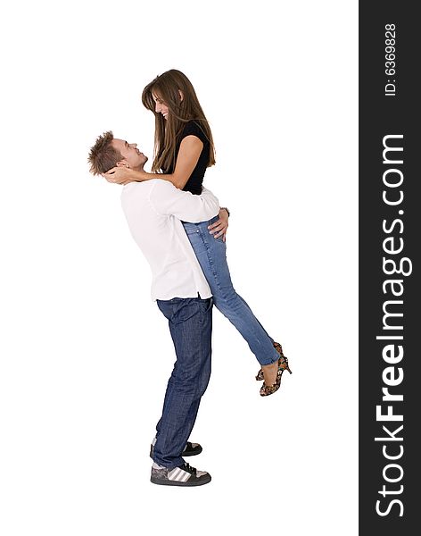 Boy is holding his girlfriend in the air. Boy is holding his girlfriend in the air