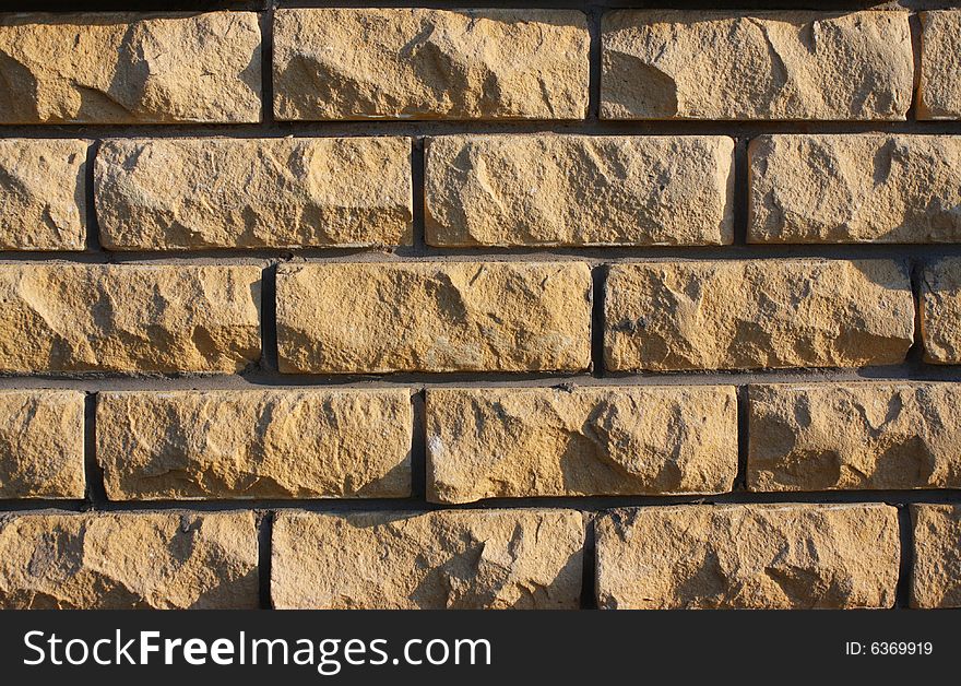 Broun old brick textured wall. Cracked bricks. Broun old brick textured wall. Cracked bricks.