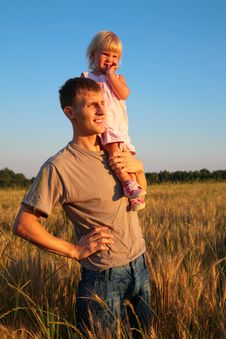 Father Hold Daughter On Shoulder On Wheaten Field Stock Photos Father Hold Daughter On Shoulder On Wheaten Field Stock Photos