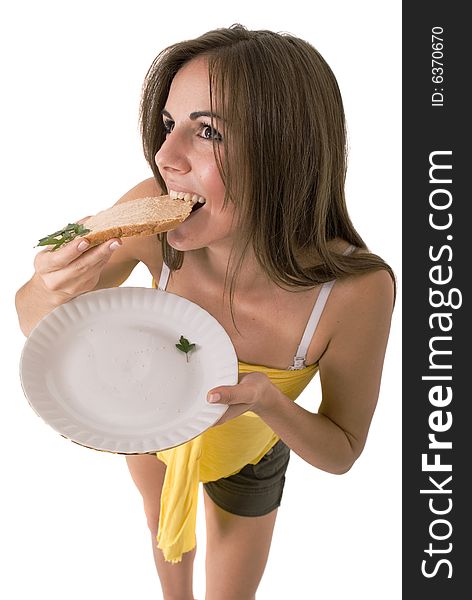 Cute girl eating a slice of bread. Cute girl eating a slice of bread