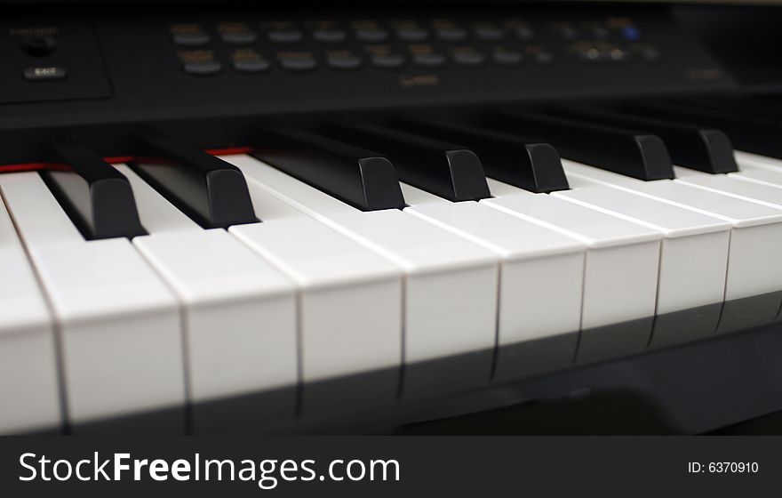 Digital piano keys close up