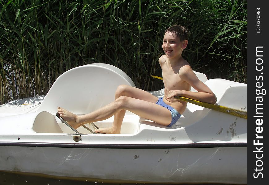 Boy In A Boat