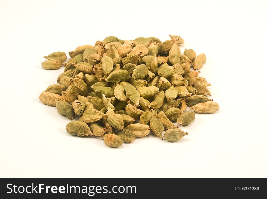 Cardamom isolated against white background