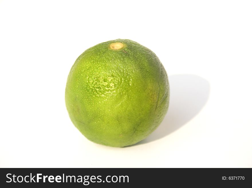 Fresh lime isolated against white