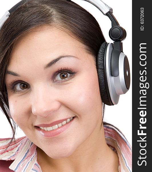 Attractive brunette woman with headphones. Attractive brunette woman with headphones