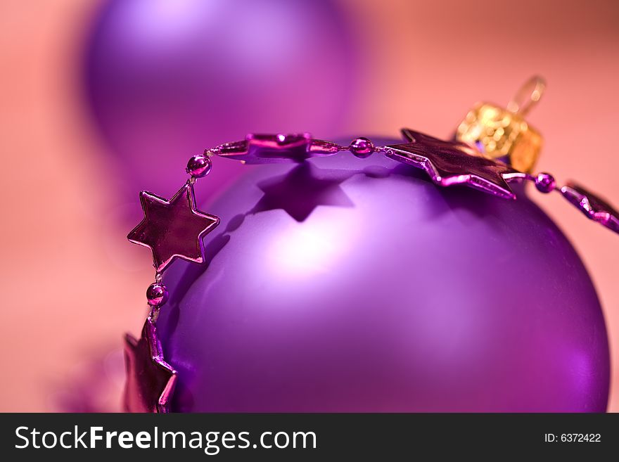 Holiday series: lilac christmas ball and starshaped garland