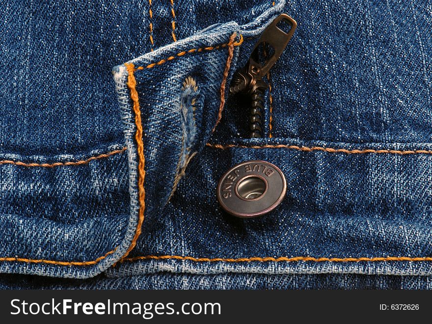 Close-up of Blue Jeans, Button, and Zipper