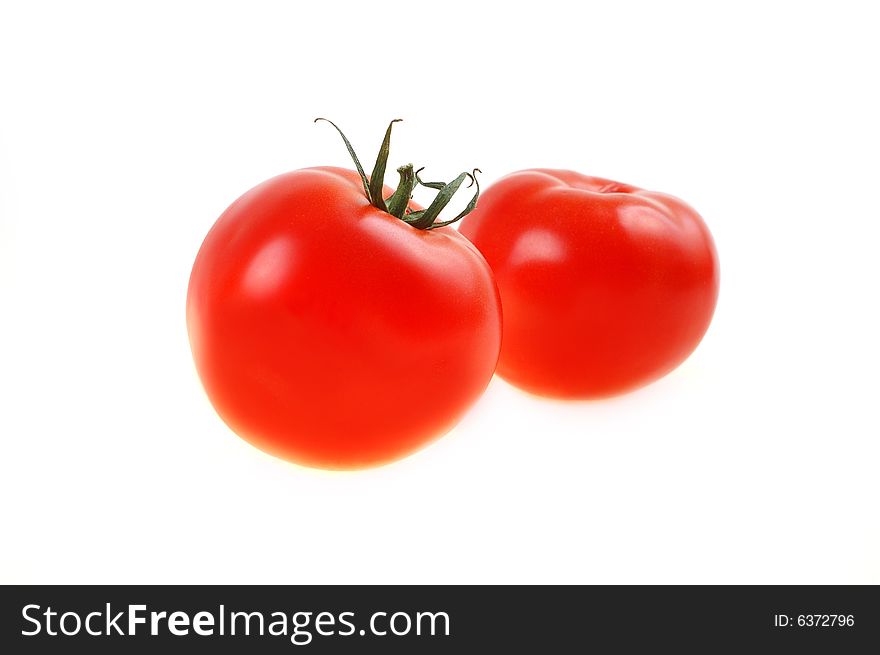 Fresh red tomatos on white background