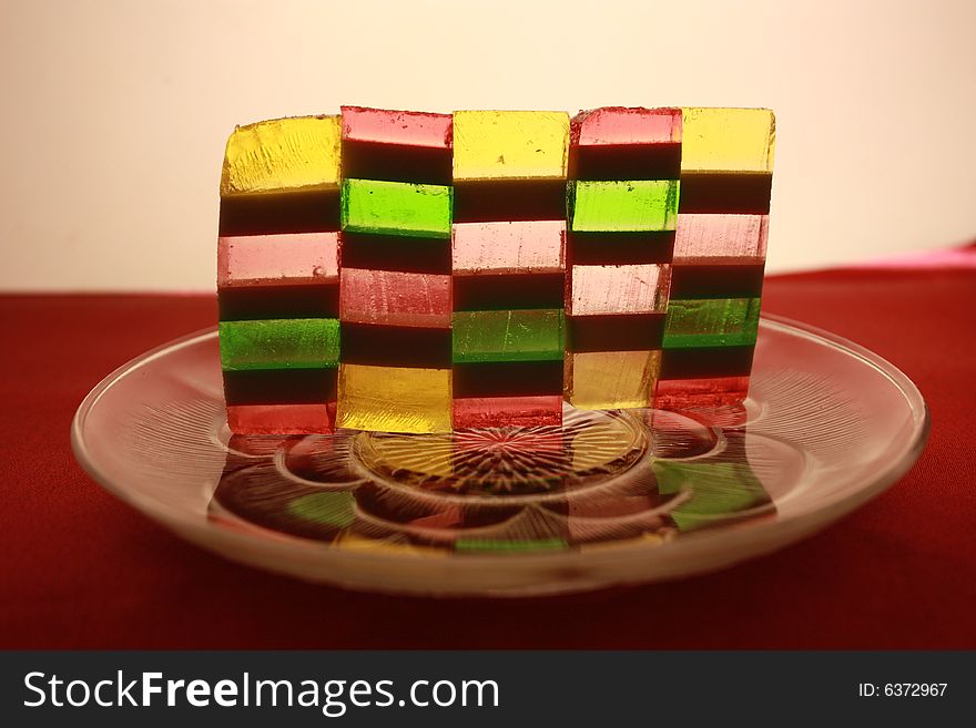 Coloured sweets on glass dish
