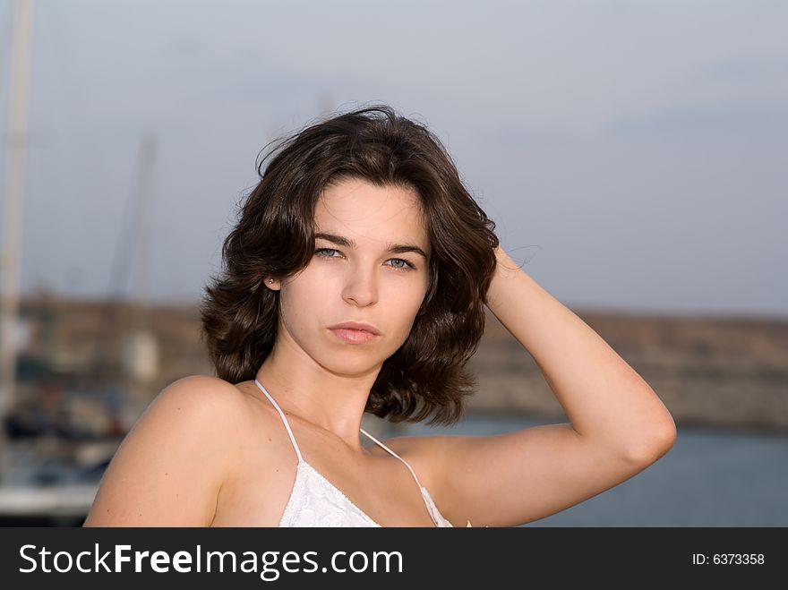 Outdoors portrait of young adult beautiful woman. Outdoors portrait of young adult beautiful woman