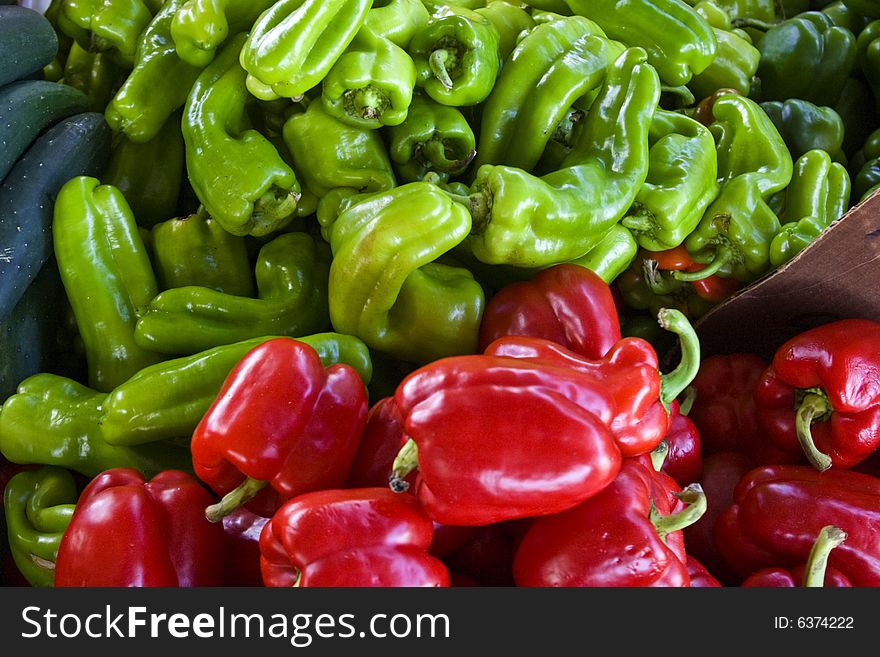 Bin of red & green hot peppers at a local farmers market.