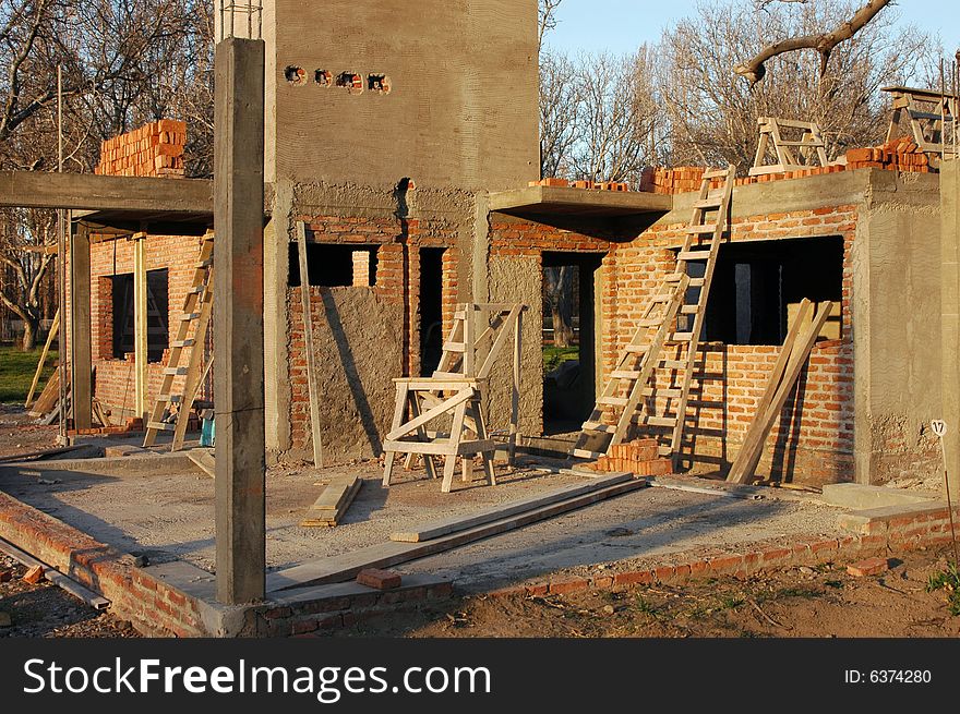 Construction o a brick house in a private neighborhood. Construction o a brick house in a private neighborhood