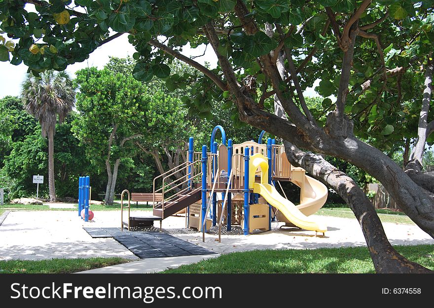 An empty playground in a tropical park in Boynton Beach Fl. An empty playground in a tropical park in Boynton Beach Fl