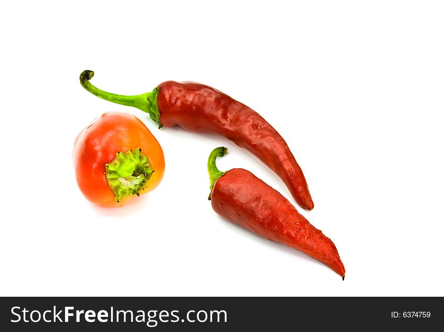 Red chili pepper on the white background.