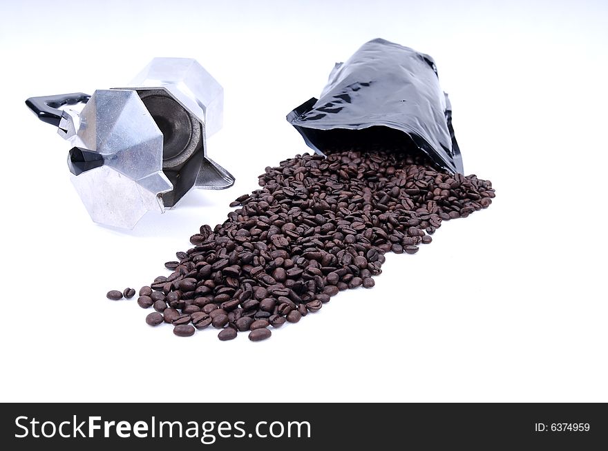 Coffee beans spilled from bag on white background. Coffee beans spilled from bag on white background