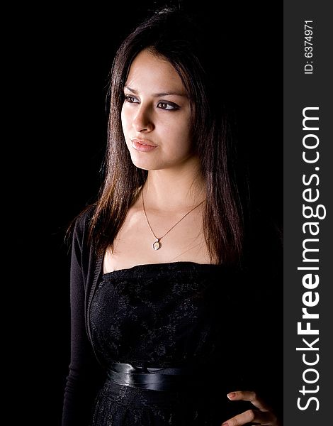 The model in a black dress with a necklace