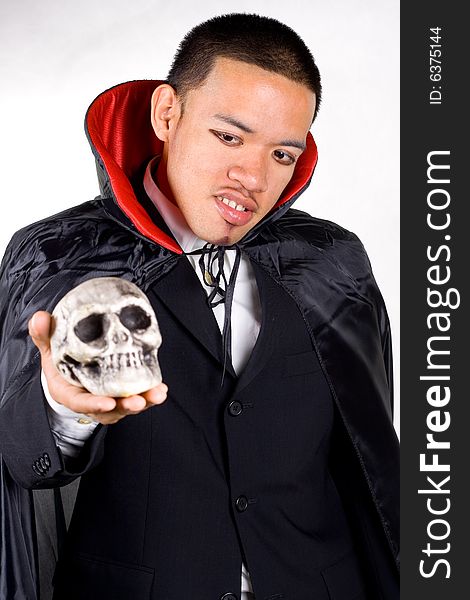 A vampire costume with the skull