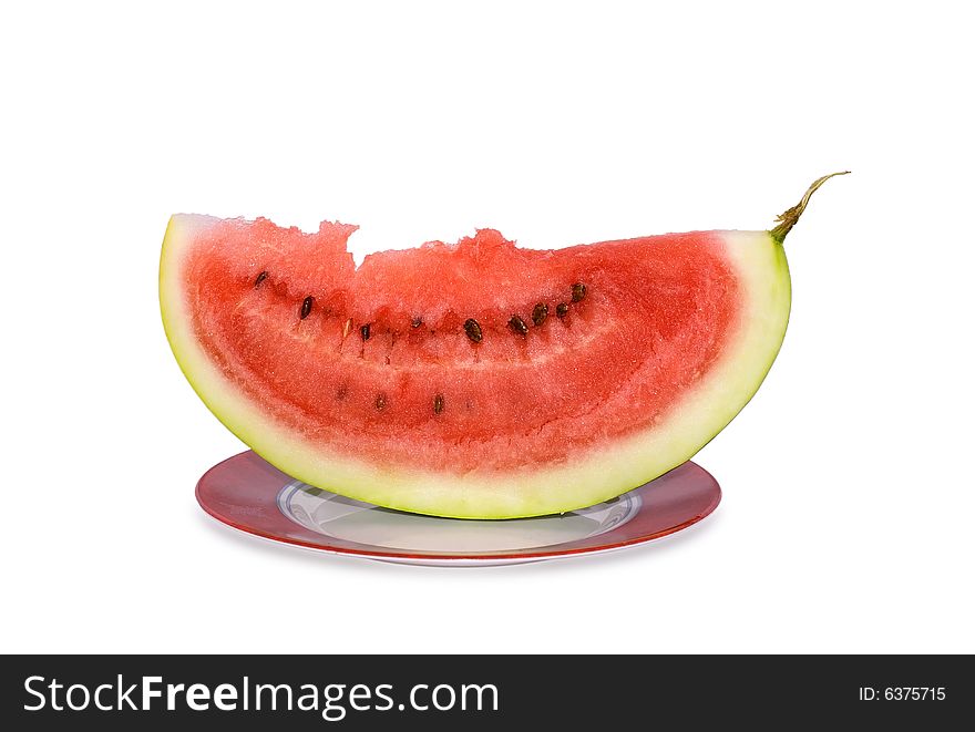 Watermelon and crusts on a plate isolated on a white background