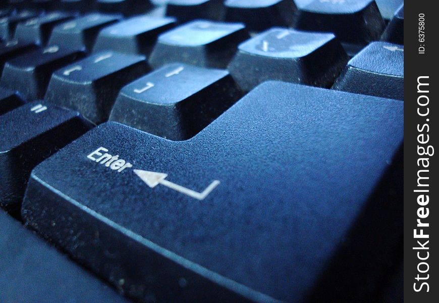 Enter button on the blue keyboard