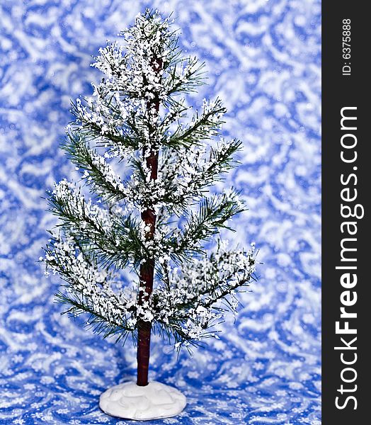 Winter tree on a blue winter background.