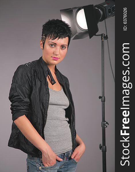 Young beauty woman in the photostudio