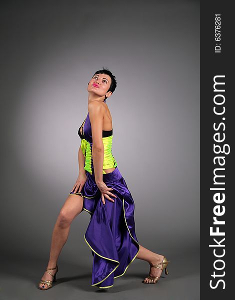 Dancing Young Woman In Dark Blue Dress