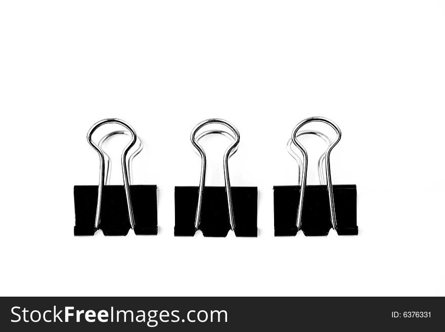 Three black clamps isolated on a white background.