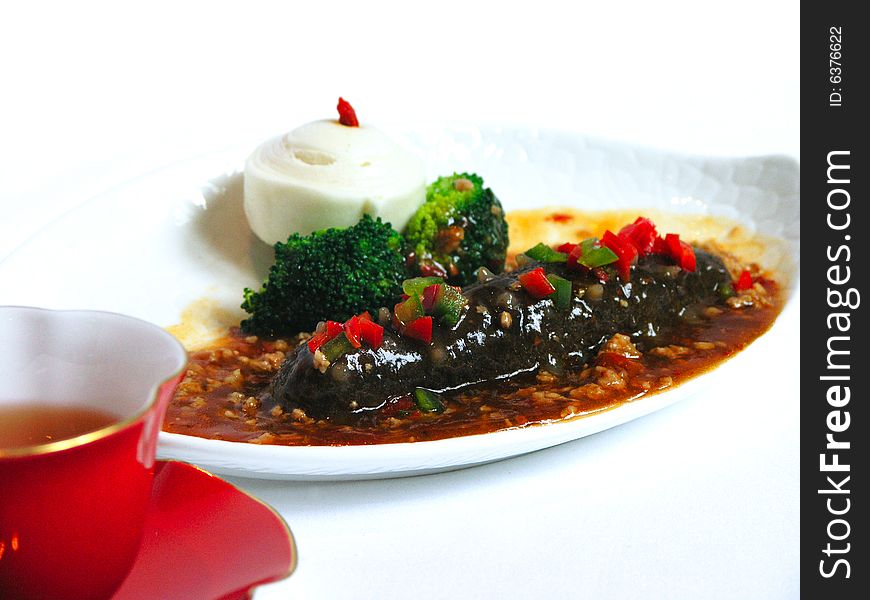 Stewed japanese sea cucumber with spicy minced pork. Stewed japanese sea cucumber with spicy minced pork