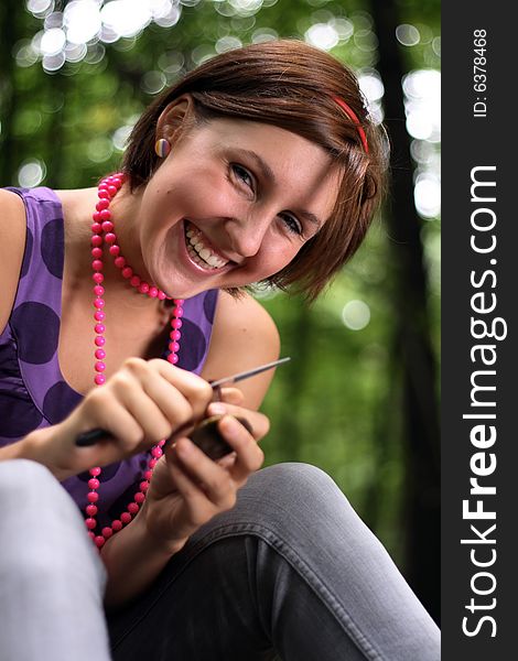 Picture of a teenager holding a mushroom in hands. Picture of a teenager holding a mushroom in hands