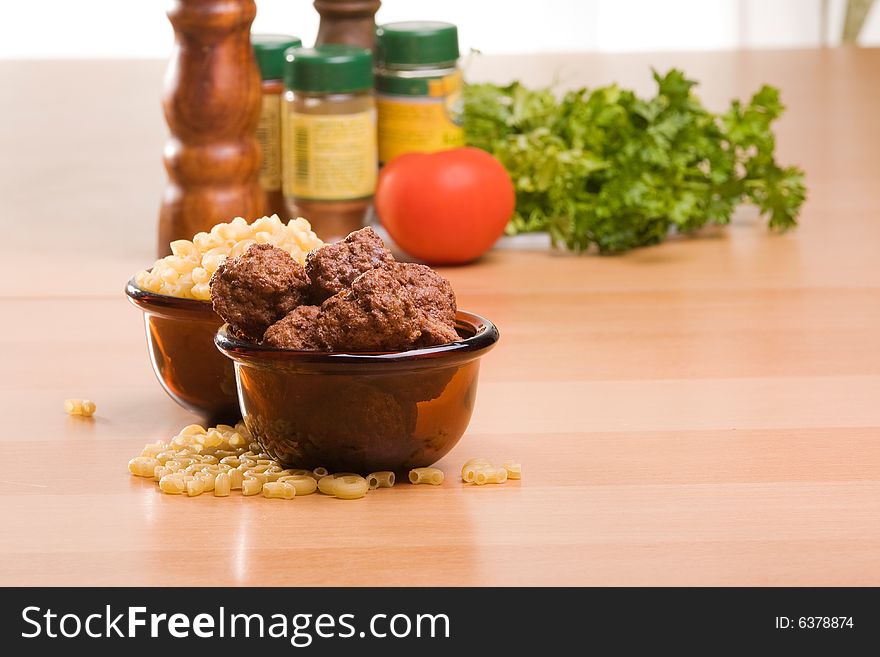 Meatballs and macaroni, food preparation.