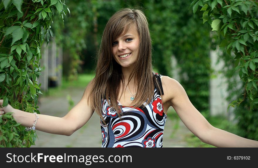 The photo presents young caucasian girl looking at a lens of high resolution camera.
The picture was taken in a serene area among the trees. The photo presents young caucasian girl looking at a lens of high resolution camera.
The picture was taken in a serene area among the trees.