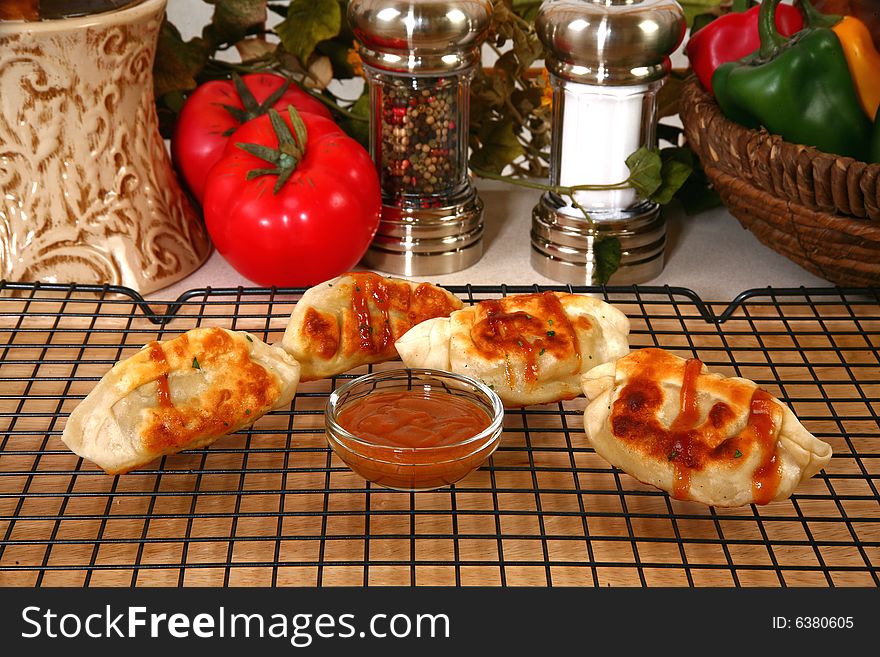 Asian dumplings and peanut dipping sauce.