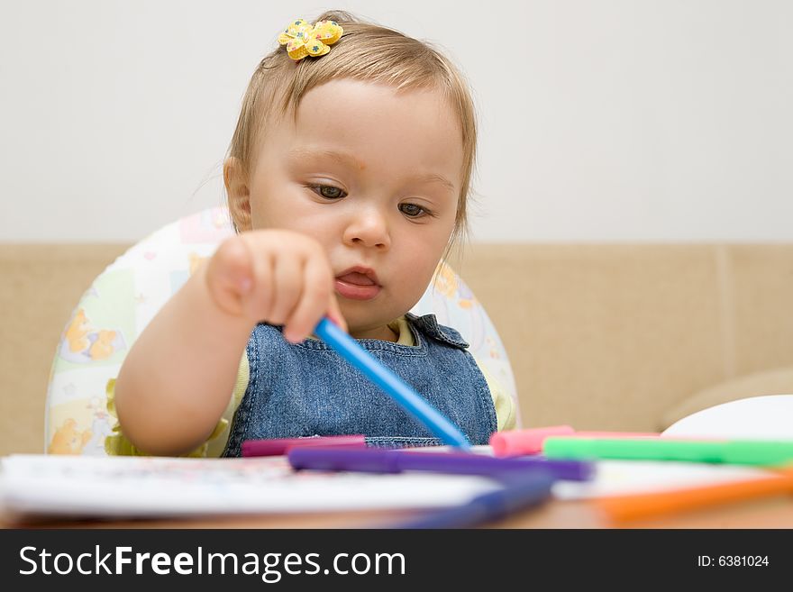 Sweet baby girl learning drawing. Sweet baby girl learning drawing