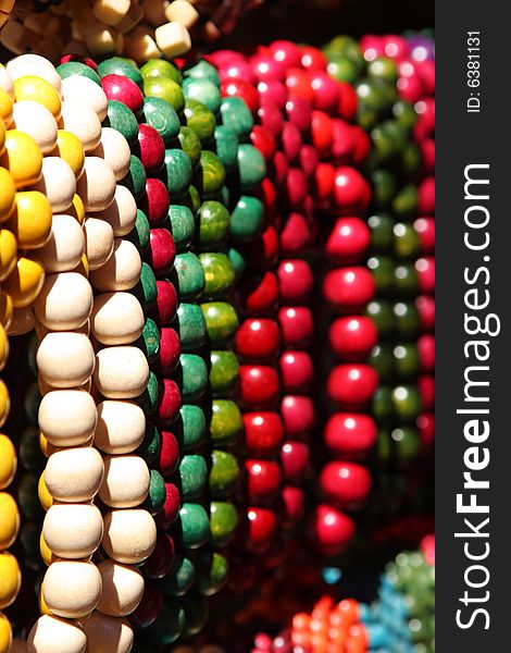 Abstract colorful bright wooden beads in street shop. Abstract colorful bright wooden beads in street shop