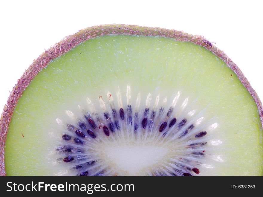 Close up of single kiwifruit slice.